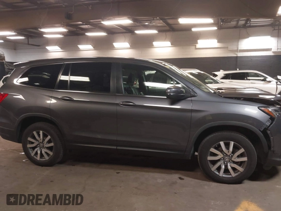 2019 Honda Pilot EX-L with VIN 5FNYF6H57KB062293, listed as a IAAI auction lot 41936964 with 93,012 mi miles and . Bid and sale history available at DreamBid. Image 13.