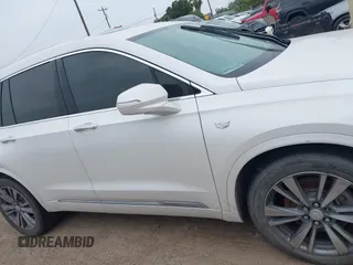 2020 Cadillac XT6 FWD Premium Luxury z VIN 1GYKPCRS2LZ101061, wystawiony jako IAAI lot #42113360 z przebiegiem Nie podano mil oraz . Historia ofert i sprzedaży dostępna na DreamBid. Obrazek 13.