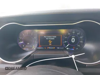 2021 Ford Mustang EcoBoost z VIN 1FA6P8TD5M5133239, wystawiony jako IAAI lot #41899042 z przebiegiem 65 553 mil mil oraz . Historia ofert i sprzedaży dostępna na DreamBid. Obrazek 7.