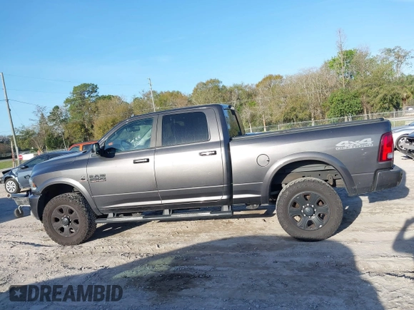 2017 Ram 2500 Laramie with VIN 3C6UR5FLXHG554442, listed as a IAAI auction lot 41651499 with 183,952 mi miles. Bid and sale history available at carsss.com. Image 14.