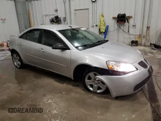 2009 Pontiac G6 1SA z VIN 1G2ZG57B294112235, wystawiony jako Copart lot #86734174 z przebiegiem 111 612 mil mil oraz Nie do naprawy. Historia ofert i sprzedaży dostępna na DreamBid. Obrazek 4.