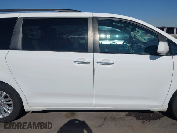 2012 Toyota Sienna XLE AAS z VIN 5TDYK3DC5CS218522, wystawiony jako IAAI lot #42605170 z przebiegiem 236 508 mil mil oraz . Historia ofert i sprzedaży dostępna na DreamBid. Obrazek 13.