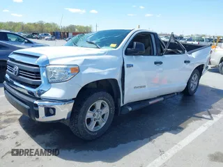 2014 Toyota Tundra 4WD Truck SR5 with VIN 5TFDW5F1XEX390763, listed as a IAAI auction lot 41973864 with 117,369 mi miles. Bid and sale history available at carsss.com. Image 2.