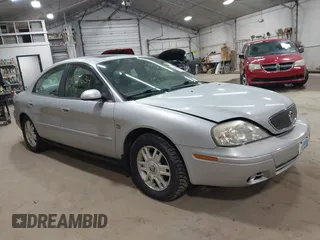 2004 Mercury Sable LS Premium with VIN 1MEFM55S04A628323, listed as a IAAI auction lot 41888634 with 70,725 mi miles. Bid and sale history available at carsss.com. Image 1.