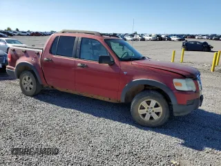 2007 Ford Explorer Sport Trac XLT with VIN 1FMEU51887UA09474, listed as a Copart auction lot 57625115 with 128,443 mi miles and Salvage title. Bid and sale history available at DreamBid. Image 4.