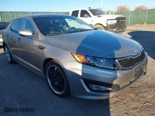 2013 Kia Optima SX w/Limited Pkg with VIN 5XXGR4A63DG124072, listed as a IAAI auction lot 40998791 with 144,696 mi miles. Bid and sale history available at carsss.com. Image 1.