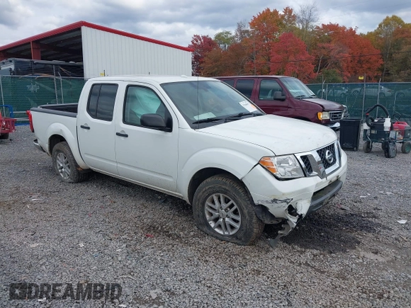 2014 Nissan Frontier SV with VIN 1N6AD0EV2EN718895, listed as a IAAI auction lot 40332972 with 53,391 mi miles and . Bid and sale history available at DreamBid. Image 1.