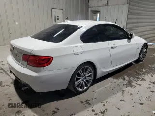 2012 BMW 3 Series 335i with VIN WBAKG7C56CE803128, listed as a Copart auction lot 88415715 with 103,061 mi miles and Clean Title. Bid and sale history available at carsss.com. Image 3.