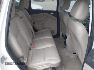 2014 Ford Escape SE with VIN 1FMCU9GX9EUB15944, listed as a IAAI auction lot 42110269 with 120,297 mi miles and . Bid and sale history available at DreamBid. Image 8.