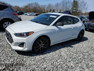 2020 Hyundai Veloster 2.0 с VIN KMHTG6AF7LU027994, выставлен на аукционе Copart как лот 52065775 с пробегом 87 433 миль миль и Списание • Salvage title. История ставок и продаж доступна на DreamBid. Изображение 1.