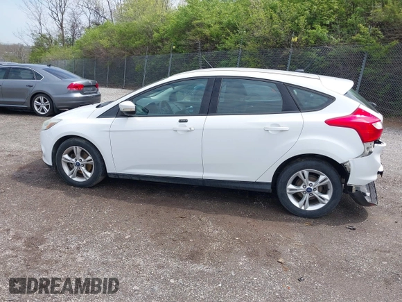 2014 Ford Focus SE with VIN 1FADP3K28EL291260, listed as a IAAI auction lot 42029753 with 98,686 mi miles. Bid and sale history available at carsss.com. Image 15.