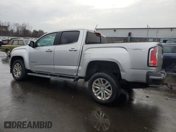 2015 GMC Canyon 4WD SLT with VIN 1GTG6CE35F1251486, listed as a Copart auction lot 46884015 with 162,144 mi miles and Salvage Title. Bid and sale history available at carsss.com. Image 2.