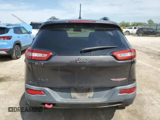 2017 Jeep Cherokee Trailhawk with VIN 1C4PJMBS0HW589626, listed as a Copart auction lot 53981435 with 105,318 mi miles and Salvage title. Bid and sale history available at DreamBid. Image 6.