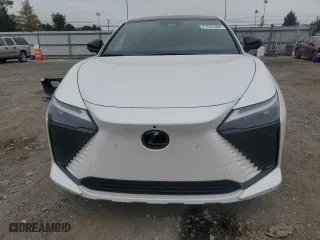 2023 Lexus RZ with VIN JTJAAAAB4PA013942, listed as a Copart auction lot 71572484 with 3,153 mi miles and Salvage Title. Bid and sale history available at carsss.com. Image 5.
