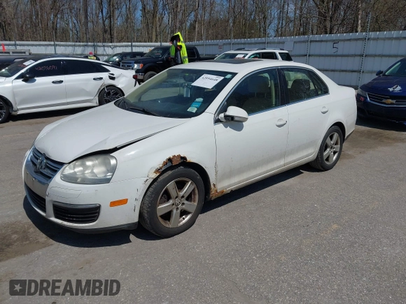 2009 Volkswagen Jetta SE z VIN 3VWRM71K99M057390, wystawiony jako IAAI lot #42094648 z przebiegiem 168 533 mil mil oraz . Historia ofert i sprzedaży dostępna na DreamBid. Obrazek 18.