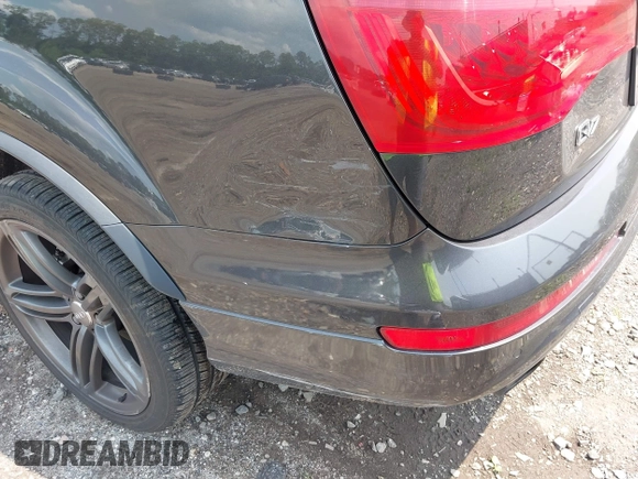 2014 Audi Q7 S line Prestige z VIN WA1DGAFE5ED006957, wystawiony jako IAAI lot #42488440 z przebiegiem 123 814 mil mil oraz . Historia ofert i sprzedaży dostępna na DreamBid. Obrazek 18.