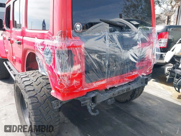 2019 Jeep Wrangler Unlimited Sahara with VIN 1C4HJXEN0KW552028, listed as a IAAI auction lot 41934634 with 53,054 mi miles and . Bid and sale history available at DreamBid. Image 6.