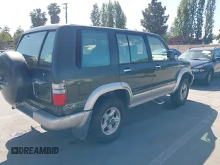 2002 Isuzu Trooper S z VIN JACDJ58X427J08532, wystawiony jako IAAI lot #42228494 z przebiegiem Nie podano mil oraz . Historia ofert i sprzedaży dostępna na DreamBid. Obrazek 4.