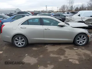 2013 Cadillac ATS z VIN 1G6AA5RA5D0131069, wystawiony jako IAAI lot #41708927 z przebiegiem 166 624 mil mil oraz . Historia ofert i sprzedaży dostępna na DreamBid. Obrazek 13.