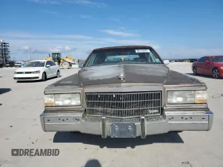 1990 Cadillac Brougham z VIN 1G6DW5476LR727151, wystawiony jako Copart lot #88145665 z przebiegiem Nie podano mil oraz Tytuł czysty. Historia ofert i sprzedaży dostępna na DreamBid. Obrazek 5.