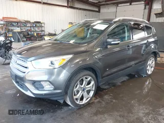 2019 Ford Escape Titanium with VIN 1FMCU9J97KUC55772, listed as a IAAI auction lot 42514001 with 77,737 mi miles and . Bid and sale history available at DreamBid. Image 19.