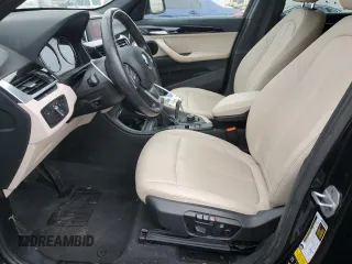 2018 BMW X1 xDrive28i z VIN WBXHT3C39J5L34133, wystawiony jako Copart lot #60195805 z przebiegiem 49 551 mil mil oraz Szkoda całkowita • Salvage title. Historia ofert i sprzedaży dostępna na DreamBid. Obrazek 7.