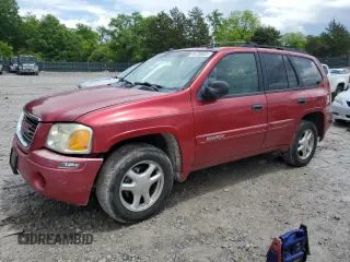 2005 GMC Envoy SLE z VIN 1GKDT13S752203494, wystawiony jako Copart lot #56150605 z przebiegiem 243 475 mil mil oraz Szkody całkowita. Historia ofert i sprzedaży dostępna na DreamBid. Obrazek 1.