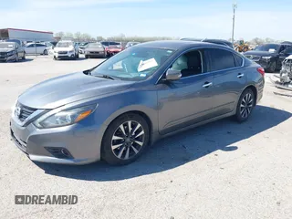 2016 Nissan Altima 2.5 S with VIN 1N4AL3AP3GC234477, listed as a IAAI auction lot 41860302 with 153,667 mi miles. Bid and sale history available at carsss.com. Image 17.