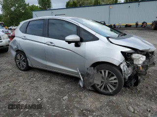 2015 Honda Fit EX-L with VIN 3HGGK5H84FM703169, listed as a Copart auction lot 57472305 with 176,377 mi miles and Salvage title. Bid and sale history available at DreamBid. Image 4.