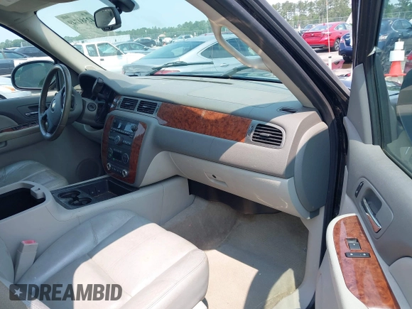 2007 Chevrolet Tahoe LTZ with VIN 1GNFC13007R111180, listed as a IAAI auction lot 42381749 with 126,472 mi miles and . Bid and sale history available at DreamBid. Image 5.