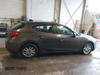 2015 Mazda 3 i Grand Touring z VIN JM1BM1M70F1222597, wystawiony jako IAAI lot #41960987 z przebiegiem 40 841 mil mil oraz . Historia ofert i sprzedaży dostępna na DreamBid. Obrazek 13.