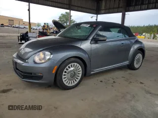 2014 Volkswagen Beetle 1.8T w/Tech with VIN 3VW507AT4EM816573, listed as a Copart auction lot 55207665 with 86,637 mi miles and Salvage title. Bid and sale history available at DreamBid. Image 1.