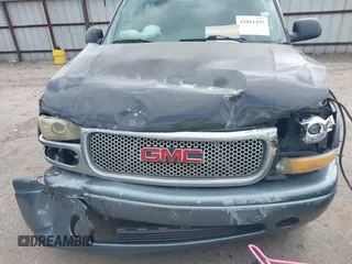 2004 GMC Yukon SLT z VIN 1GKEC13Z44J310511, wystawiony jako IAAI lot #42011475 z przebiegiem 218 746 mil mil oraz . Historia ofert i sprzedaży dostępna na DreamBid. Obrazek 10.