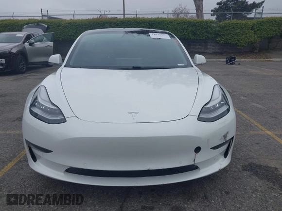 2020 Tesla Model 3 Long Range with VIN 5YJ3E1EB0LF803217, listed as a IAAI auction lot 41871940 with 130,391 mi miles. Bid and sale history available at carsss.com. Image 12.