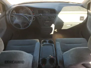1999 Honda Odyssey EX with VIN 2HKRL1860XH541737, listed as a Copart auction lot 88897965 with 112,164 mi miles and Salvage title. Bid and sale history available at DreamBid. Image 8.
