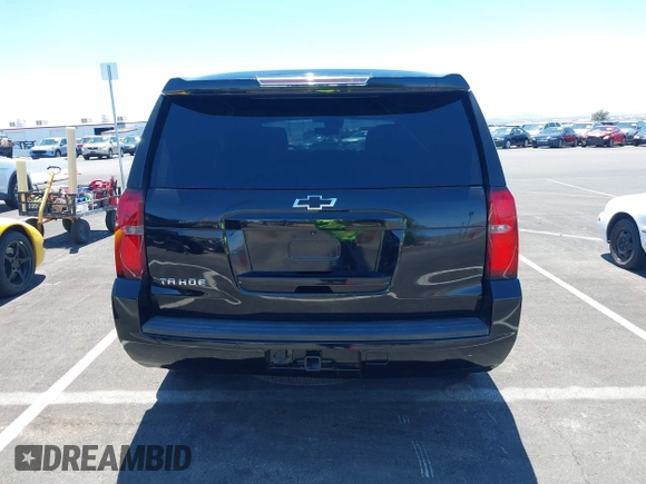 2015 Chevrolet Tahoe Commercial z VIN 1GNLC2EC0FR629983, wystawiony jako IAAI lot #42825604 z przebiegiem 112 410 mil mil oraz . Historia ofert i sprzedaży dostępna na DreamBid. Obrazek 16.