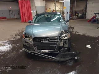 2015 Audi A3 Premium z VIN WAUBFGFF4F1090541, wystawiony jako IAAI lot #41375694 z przebiegiem 99 779 mil mil oraz . Historia ofert i sprzedaży dostępna na DreamBid. Obrazek 12.