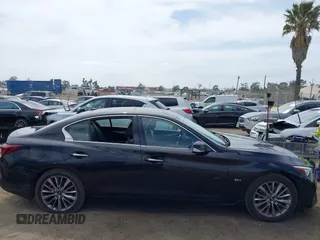 2019 Infiniti Q50 Luxe with VIN JN1EV7AP9KM543079, listed as a IAAI auction lot 42244113 with 36,291 mi miles and . Bid and sale history available at DreamBid. Image 13.