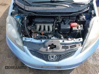 2009 Honda Fit with VIN JHMGE88209S052443, listed as a IAAI auction lot 42406572 with 140,343 mi miles and . Bid and sale history available at DreamBid. Image 10.