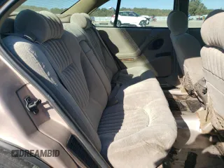 1999 Pontiac Bonneville SE z VIN 1G2HX52K4XH247855, wystawiony jako Copart lot #72559044 z przebiegiem 160 677 mil mil oraz Szkoda całkowita • Salvage title. Historia ofert i sprzedaży dostępna na DreamBid. Obrazek 11.