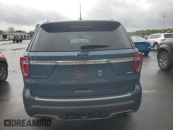 2018 Ford Explorer Platinum z VIN 1FM5K8HT9JGA66466, wystawiony jako Copart lot #56794895 z przebiegiem 84 733 mil mil oraz Szkoda całkowita • Salvage title. Historia ofert i sprzedaży dostępna na DreamBid. Obrazek 6.