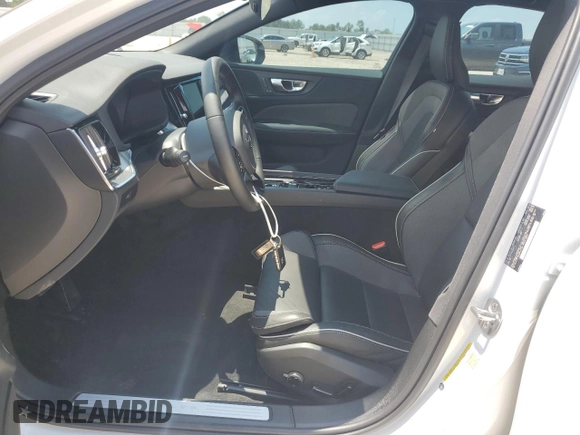 2024 Volvo S60 Plus Black Edition with VIN 7JRL12FHXRG281975, listed as a Copart auction lot 64807344 with 5,629 mi miles and Salvage title. Bid and sale history available at DreamBid. Image 7.