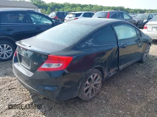2012 Honda Civic Si z VIN 2HGFG4A51CH708492, wystawiony jako IAAI lot #42399015 z przebiegiem 200 224 mil mil oraz . Historia ofert i sprzedaży dostępna na DreamBid. Obrazek 4.
