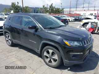 2017 Jeep Compass Latitude with VIN 3C4NJCBB1HT658802, listed as a IAAI auction lot 41957385 with 102,733 mi miles and . Bid and sale history available at DreamBid. Image 1.