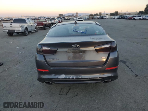 2015 Kia Optima LX with VIN 5XXGM4A72FG469281, listed as a Copart auction lot 83656144 with 129,491 mi miles and Salvage Title. Bid and sale history available at DreamBid. Image 6.