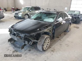 2014 Cadillac CTS Luxury AWD with VIN 1G6AX5S31E0143179, listed as a IAAI auction lot 41421639 with 135,810 mi miles and . Bid and sale history available at DreamBid. Image 2.