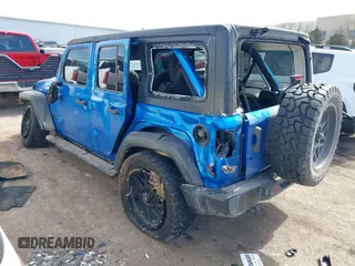 2023 Jeep Wrangler Sport S with VIN 1C4HJXDN6PW592915, listed as a IAAI auction lot 41662077 with 43,129 mi miles and . Bid and sale history available at DreamBid. Image 3.