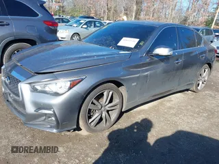 2019 Infiniti Q50 Luxe z VIN JN1EV7AR2KM590794, wystawiony jako IAAI lot #40841640 z przebiegiem 68 720 mil mil oraz . Historia ofert i sprzedaży dostępna na DreamBid. Obrazek 2.