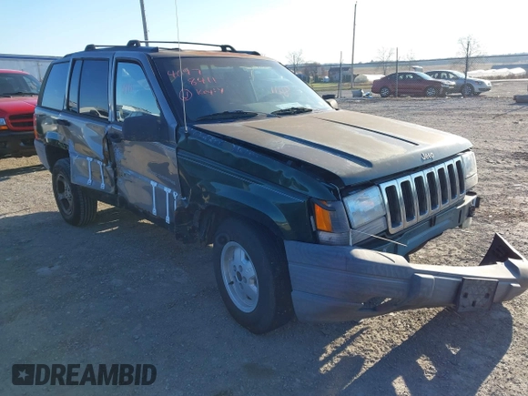 1997 Jeep Grand Cherokee Laredo with VIN 1J4GZ58SXVC687950, listed as a IAAI auction lot 40978411 with 176,514 mi miles. Bid and sale history available at carsss.com. Image 1.