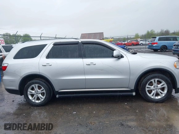 2012 Dodge Durango Crew with VIN 1C4RDJDG0CC322388, listed as a IAAI auction lot 42179814 with 124,009 mi miles and . Bid and sale history available at carsss.com. Image 13.